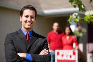 Extensive series of a Caucasian Real Estate Agent and African-American Couple in front of a home.